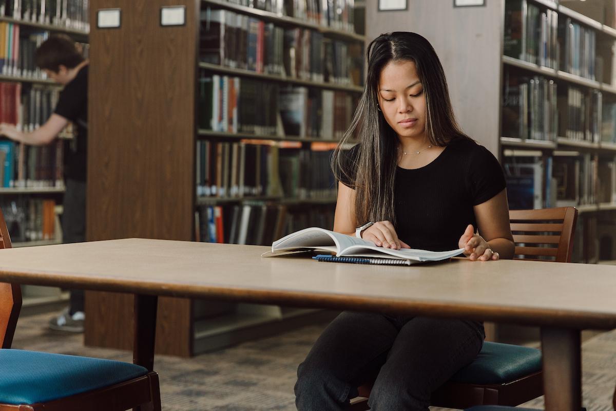 Student studying in Perkins Library